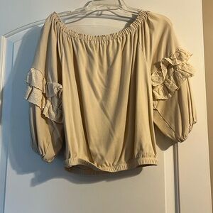 Off the shoulder cream blouse